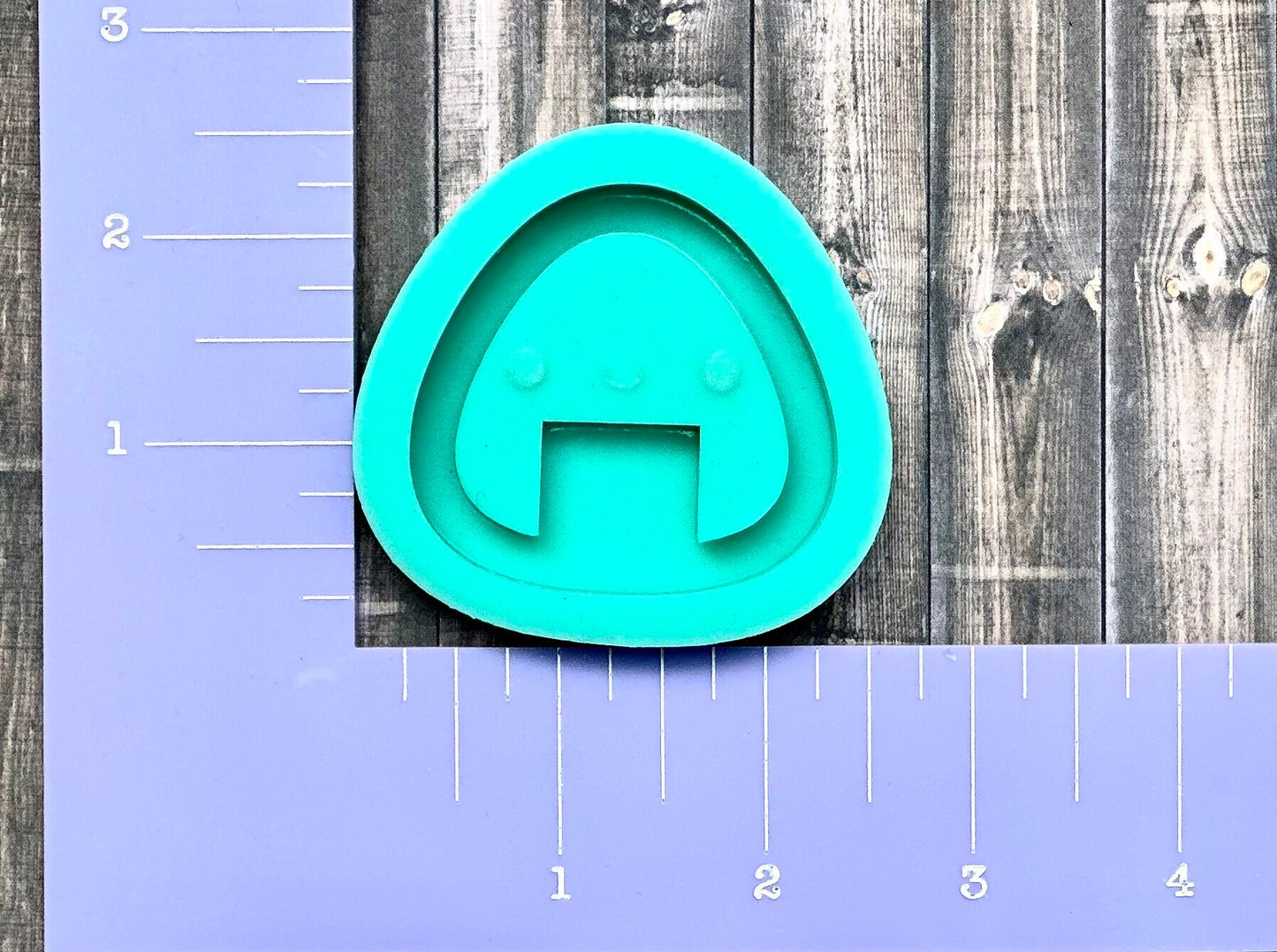 Onigiri silicone shaker mold for epoxy resin.